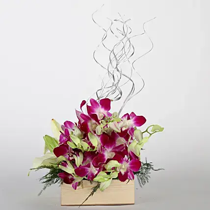 Lilies And Orchids Basket Arrangement