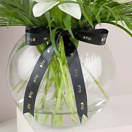 Pure White Asiatic Lilies In Fishbowl Vase