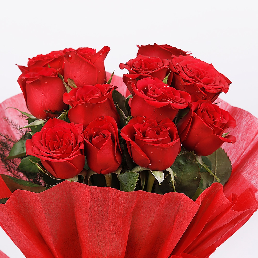 Red Roses In Red Packing