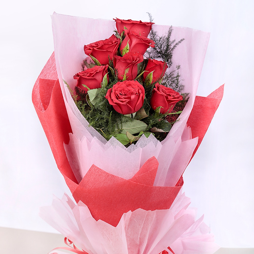 10 Red Roses In Paper Packing