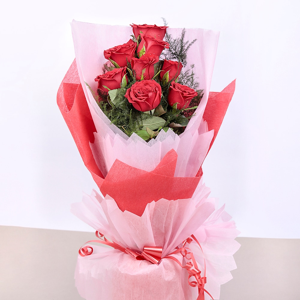 10 Red Roses In Paper Packing
