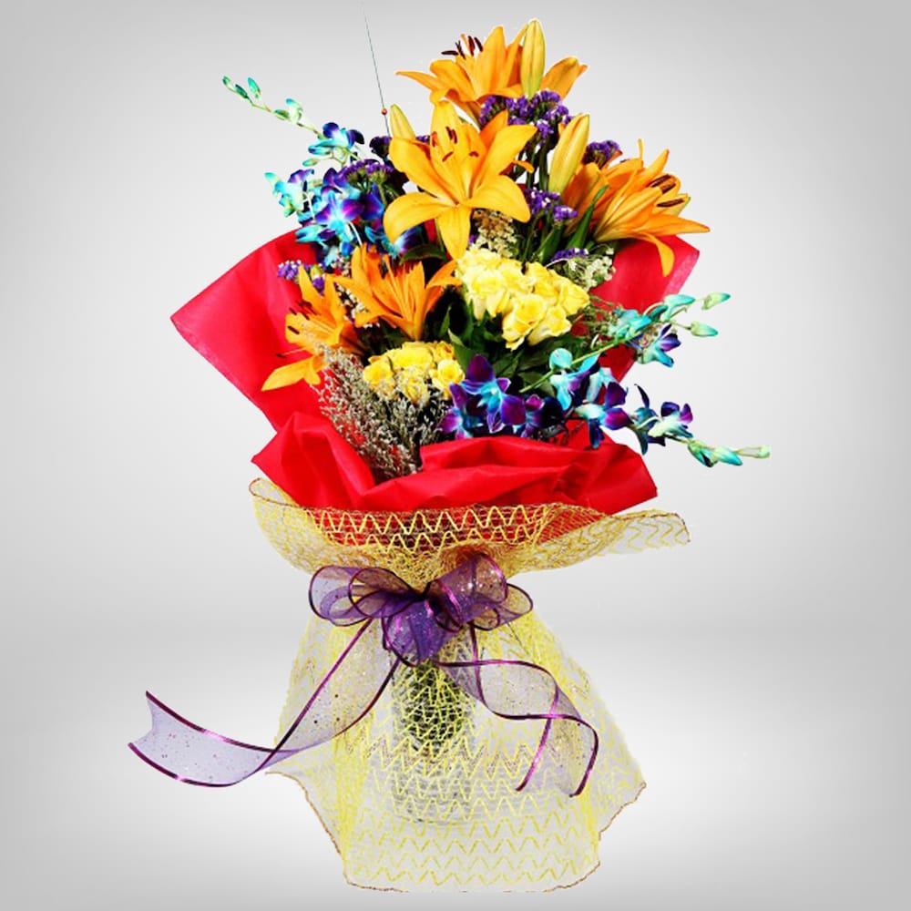 Lilies And Orchids In Red Packing