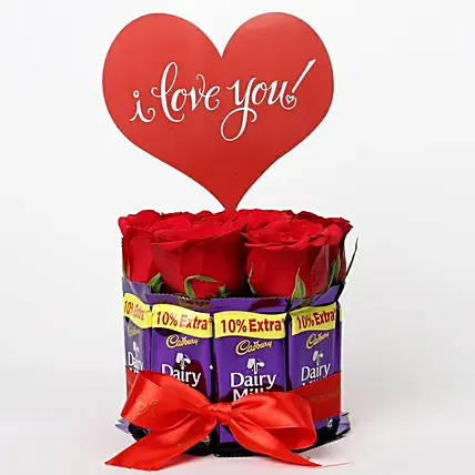 Red Roses in Glass Vase & Dairy Milk Arrangement