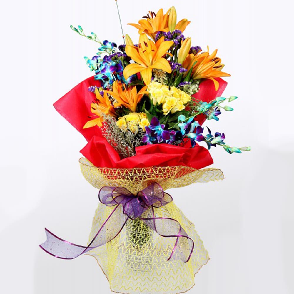 Lilies And Orchids In Red Packing